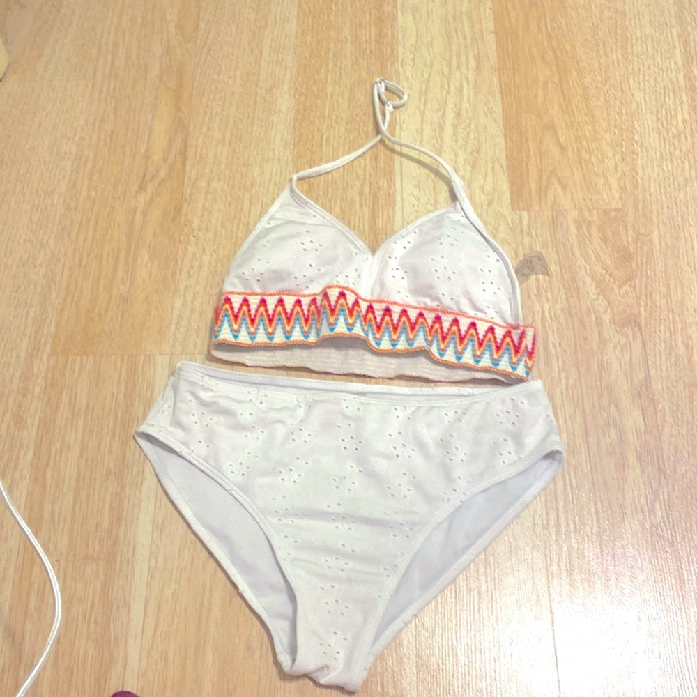 Two piece swimsuit from Temu works, good colors, pink, orange, blue, and white